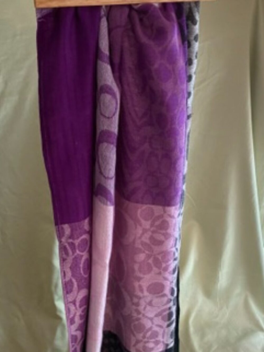 Beautiful Coach scarf in lovely shades of purples and pinks.